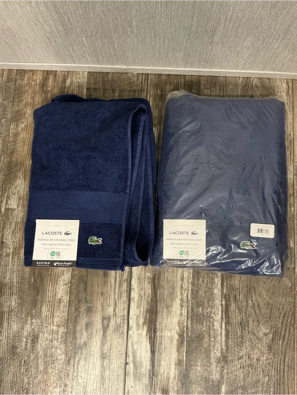 Two Lacoste Navy Blue Supima Cotton Towel